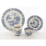 A Wood & Sons 'Yuan' pattern part dinner service, decorated with a peacock in a landscape in blue