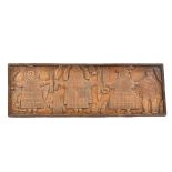 A Benin wooden carved wooden coffer lid depicting King Oba, 86 cm wide