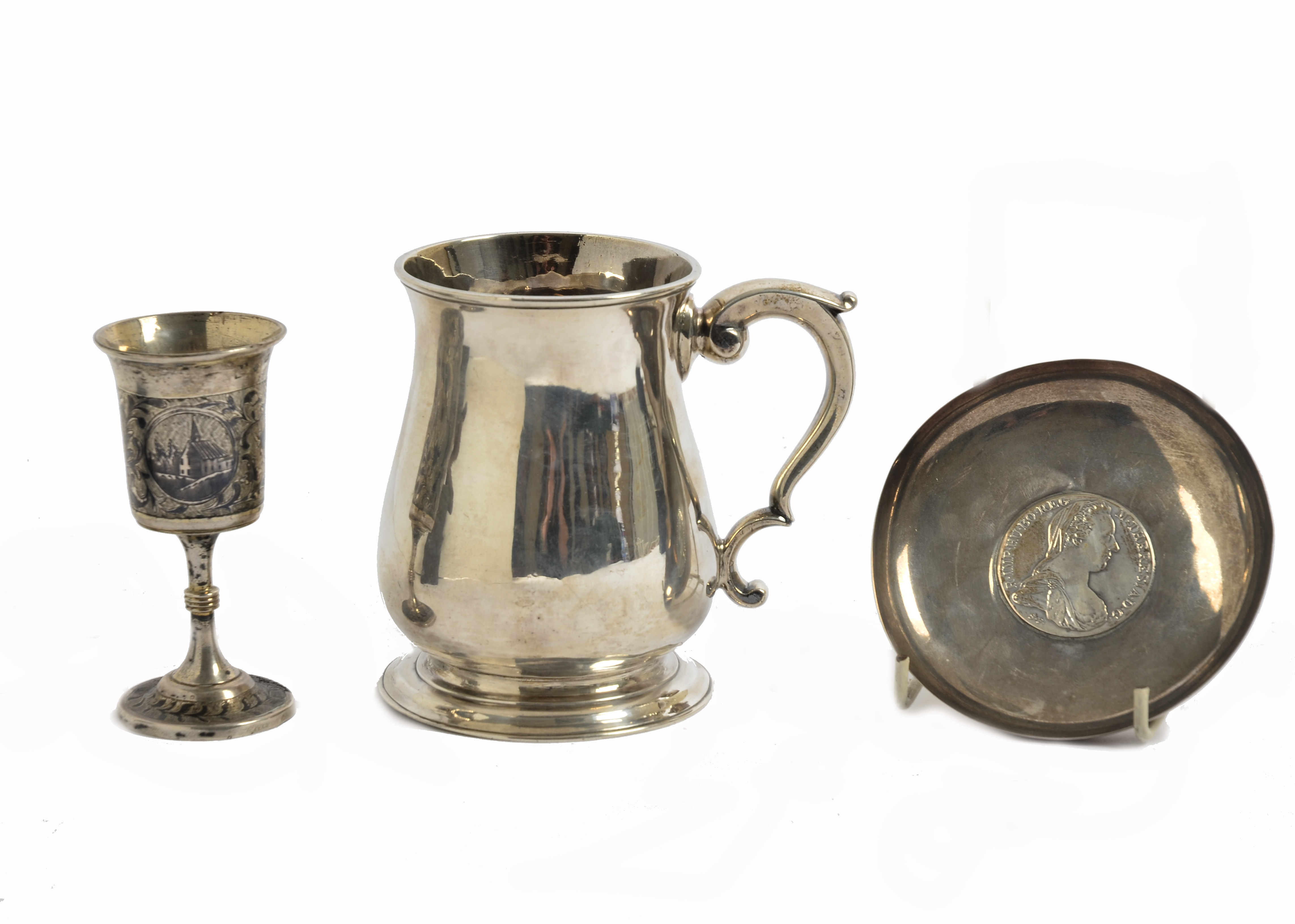 A George II silver tankard, bellied form, scroll handle, London 1747; together with a niello work