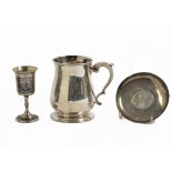 A George II silver tankard, bellied form, scroll handle, London 1747; together with a niello work