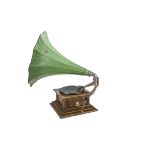 A horn gramophone, HMV Monarch/Model V, with Exhibition soundbox, oak case dated 3.11.11 and green