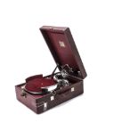 A portable gramophone, HMV model R102C, with 5 B soundbox, in red case with record tray, 1939 (motor