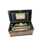 A musical box by Karrer, No. 4665, playing eight mixed airs with optional drum and six bells with