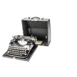 An Underwood typewriter, portable model, in case, with Warranty dated 1932