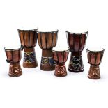 Hand Drums, eleven drums in total with eight 30cm high and three 20cm high, generally good