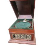 A table grand gramophone, Insula, in mahogany case with velvet-lined rim gold-blocked 'Insula Pat.