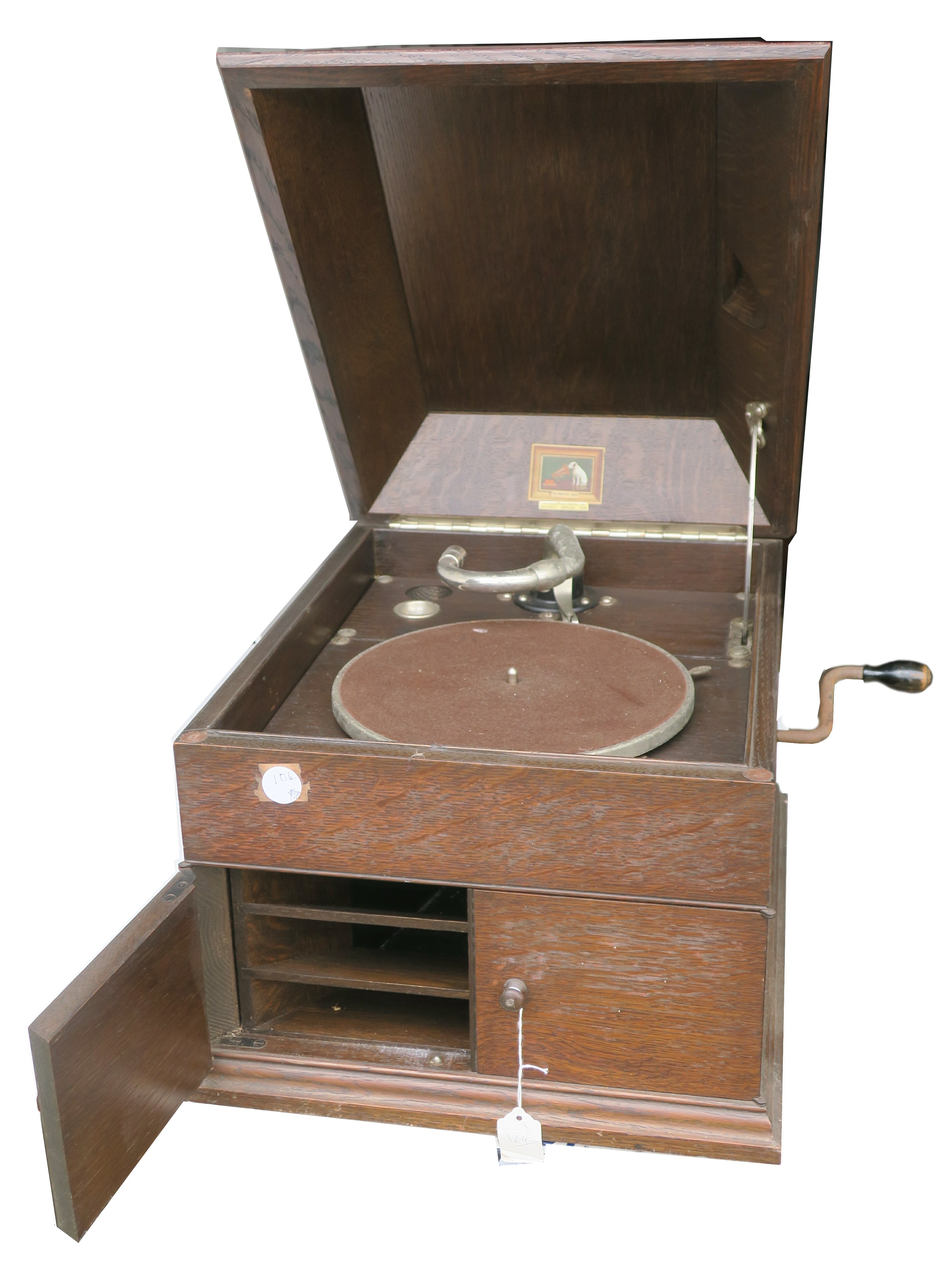 A table grand gramophone, HMV Model 111, in oak case (lacking soundbox and waste needle bowl,