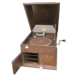 A table grand gramophone, HMV Model 111, in oak case (lacking soundbox and waste needle bowl,