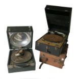 Three Decca portables, one in green case with aluminium bowl in lid, detached tone-arm assembly,
