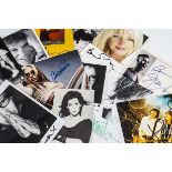 Pop Signatures, twenty-two signed photographs with artists including Phil Collins, Cher, Bonnie