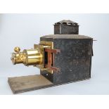 Magic Lantern, made by Newton and Co Russian iron and lacquered brass, with mahogany slide holder,