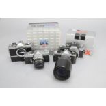 35mm SLR Cameras, a Pentax ME-Super with Sigma 70-300mm f/4-5.6 APO lens, Minolta SR-1s camera in