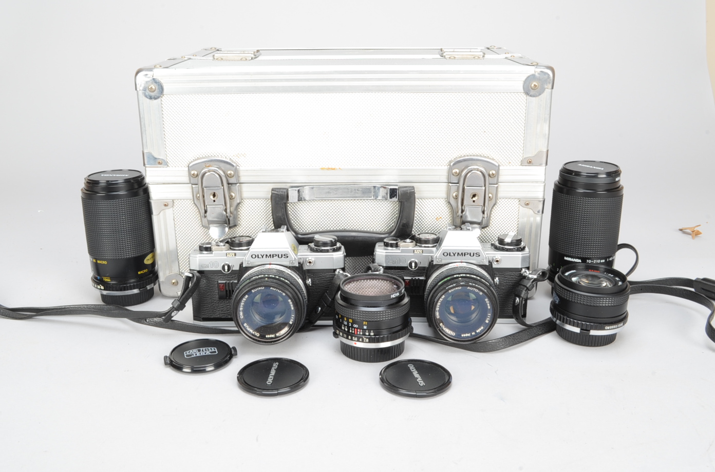 Olympus OM10 SLR Cameras and Lenses, two OM10 cameras, each with a Zuiko Auto-S 50mm f/1.8 lens,