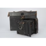 A Goerz Quarter Plate Camera, with 150mm f/6.8 Goertz lens, film pack holder, shutter working,