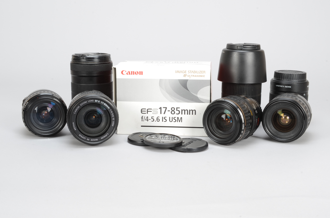 A Group of Canon EF-S and EF Lenses, Canon EF-S 17-85mm f/4-5.6 IS USM lenses (two, one boxed), a