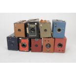 Nine Coloured Box Cameras, examples include a red No 2 Portrait Brownie, No 2 Brownies (red, olive