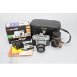 An Ihagee Exa IIa Camera, with 50mm f/2.8 Domiplan, 100mm f/4 Planar lenses and a Fujifilm A500