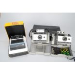 Polariod Cameras, an EK6 in makers box and two 320 automatic land cameras, one in makers box, one in