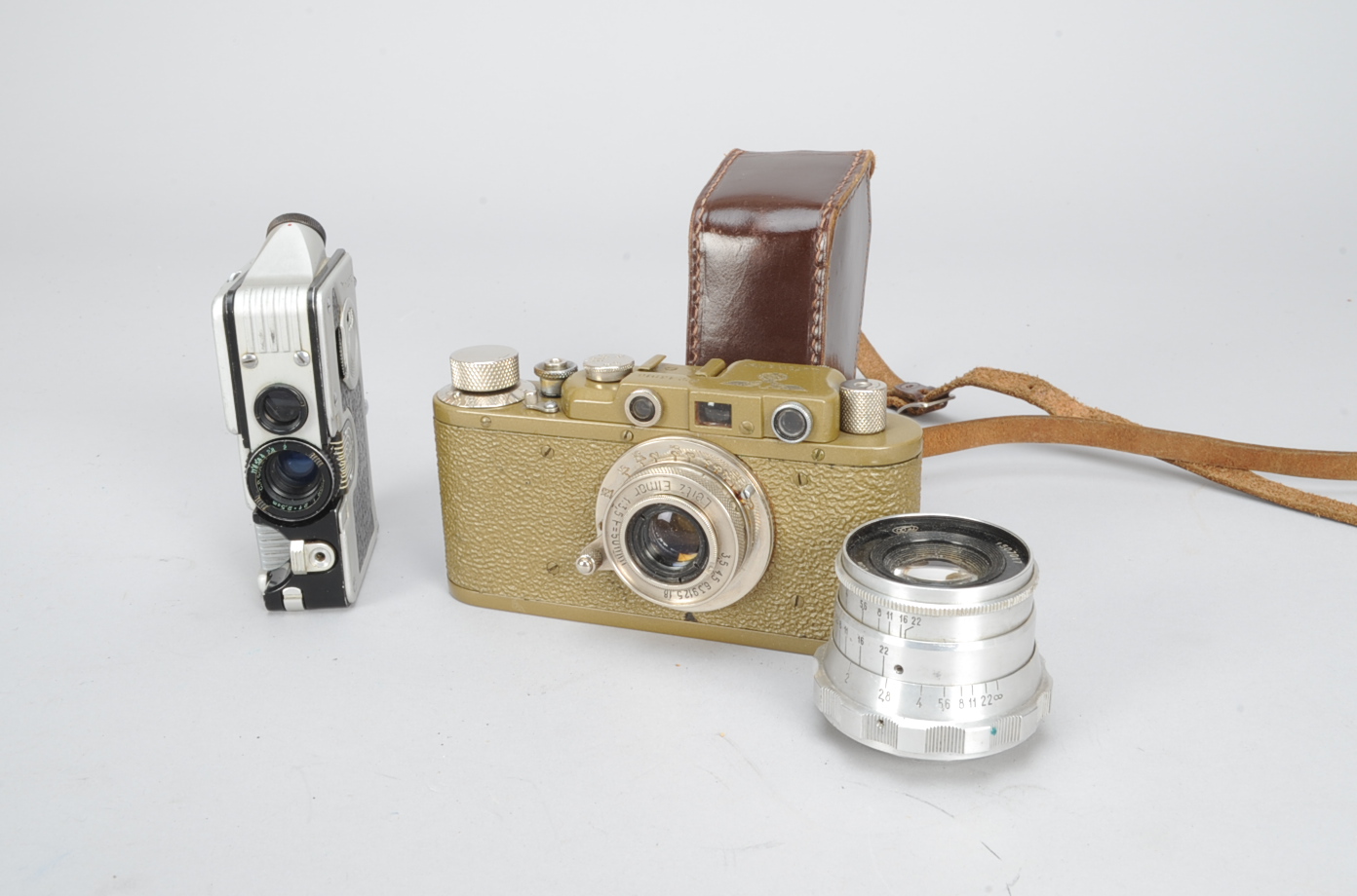 A Fake Leica II Rangefinder Camera and a Goerz Minicord , olive green, engraved on the top plate