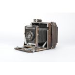 A Graflex Anniversary Speed Graphic Press Camera, with a 5 x 4in Graphic Film Holder Type 5, a Kodak