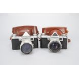 Two KW Praktina FX SLR Cameras, one with 50mm f2 Biotar lens, shutter working, body G, elements F-G,