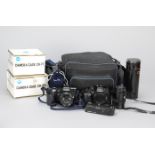 A Minolta 9000 and a Minolta 7000 AF SLR Cameras and Lenses Outfit, 9000 body, black, serial no