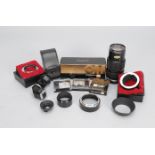 Olympus Accessories. including 75-150mm f/4 Zuiko zoom lens, focusing screens, extension tubes,