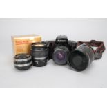 A Canon EOS Elan SLR Camera and EF Mount Lenses, including a Canon EOS Elan SLR camera with an EF