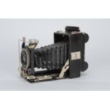 A Merkel Tikette Folding Camera, roll film back, 6 x 9cm, a Steinheil Doppelanastigmat 10.5cm f/4.