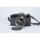 A Nikon Nikomat EL SLR Camera, black, serial no 5371693, shutter working, meter responds to light,