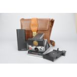 A Polaroid SX70 OneStep Folding SLR Instant Camera, with maker's case, a Polaroid Polatronic 2350