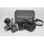 Hasselblad Accessories, a Hasselblad Ixpress V digital back, an Ixpress 24V adapter, some cabling,