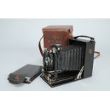 A Contessa Nettel Folding Plate Camera, with 150mm f/4.5 Dogmar lens, shutter working, body G-VG,