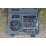 A Glensound Electronics ISDN Mixer, model GSGC5A, with padded foam case and Beyer Headphones
