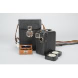 A Pathescope Motocamera 9.5mm Cine Camera, spring motor runs, with a Krauss Celix 2cm f/2.7 lens,