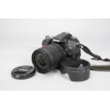 A Nikon D7000 DSLR Camera, serial no 6567188, with an AF-S Nikkor 18-105mm f/3.5-5.6G VR ED DX lens,