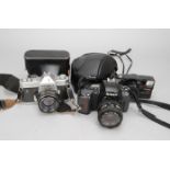 A Nikon and other SLR Cameras, a Nikon F-601 Quartz Date SLR camera with an AF Nikkor 35-70mm f/3.