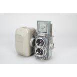 A Rolleiflex Grey Baby 4cm x 4cm TLR Camera, serial no 2005662, body F-G, some rubbing to side
