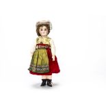 An Armand Marseille 390 child doll in traditional Swedish costume, With brown sleeping eyes,