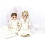 An Armand Marseille 3200 shoulder-head doll, With blue sleeping eyes, blonde mohair wig, kid body