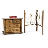 A Continental miniature or doll’s chest of drawers, light oak and maple —9½in. (24cm.) high (piece