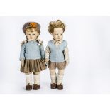 A Lenci 300 Series boy and girl, With pressed felt face with brown sided glancing eyes, the boy with