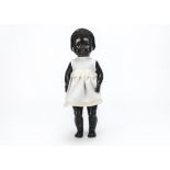 A Pedigree hard plastic black walking doll, With sleeping eyes, black curly wig and white dress —
