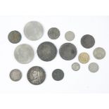 A selection of coins, dating from the 18th-20th Century, including American and British examples,