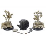 A bronzed model of a rams head, a pair of door stops in the form of wheat, two ornamental vases with