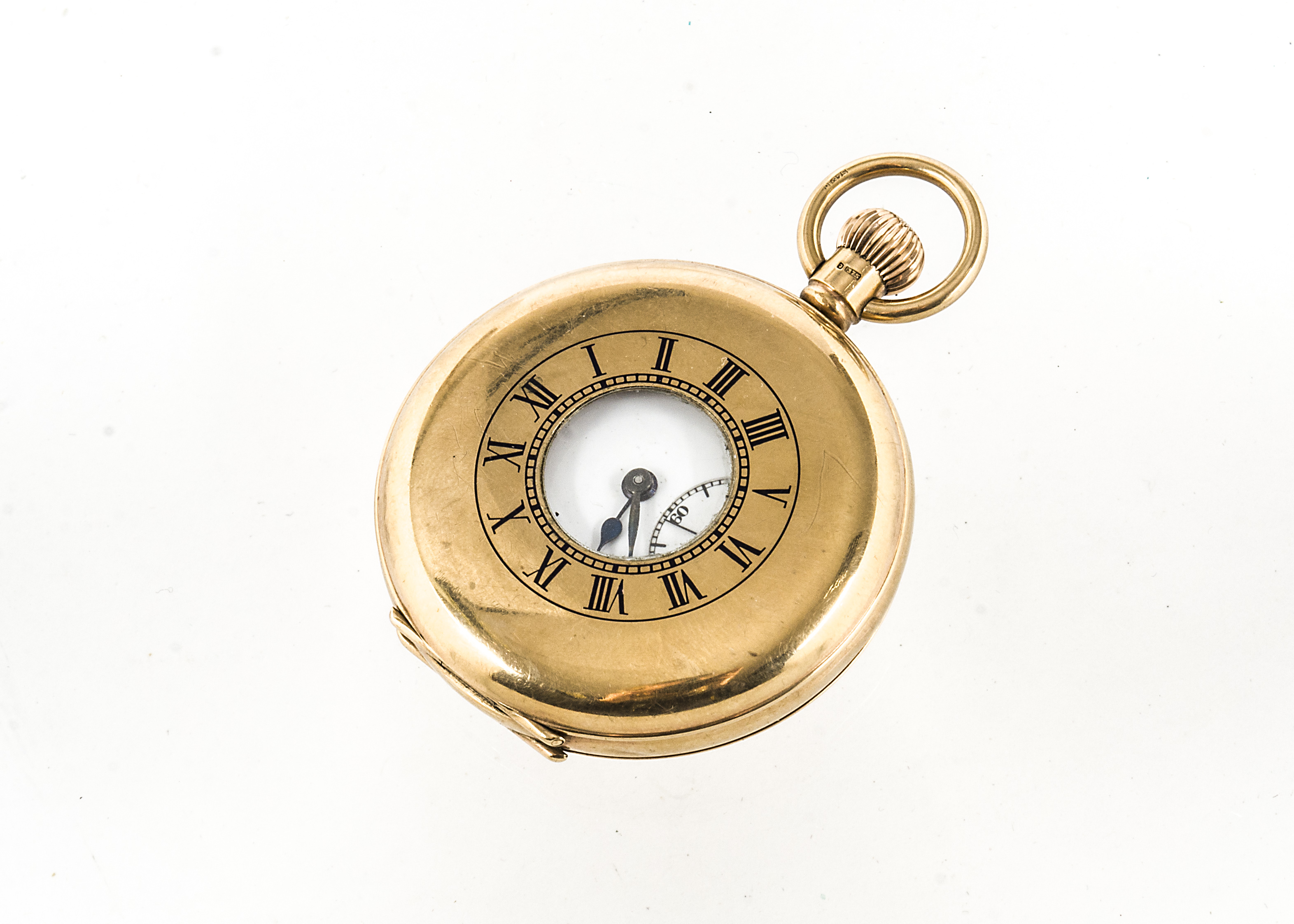 A George V 9ct gold half hunter pocket watch, 50mm case with top winder, unmarked white enamel dial,