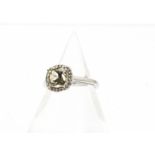 A 14ct gold zultanite and diamond dress ring, the cushion cut central stone within a band of