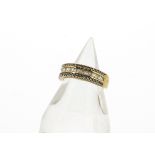 A 9ct gold diamond set half hoop eternity ring, the central channel set diamonds flanked by
