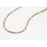 A 9ct three colour gold necklace, with stylised Greek key link decorated design, 42cm max long, 5g