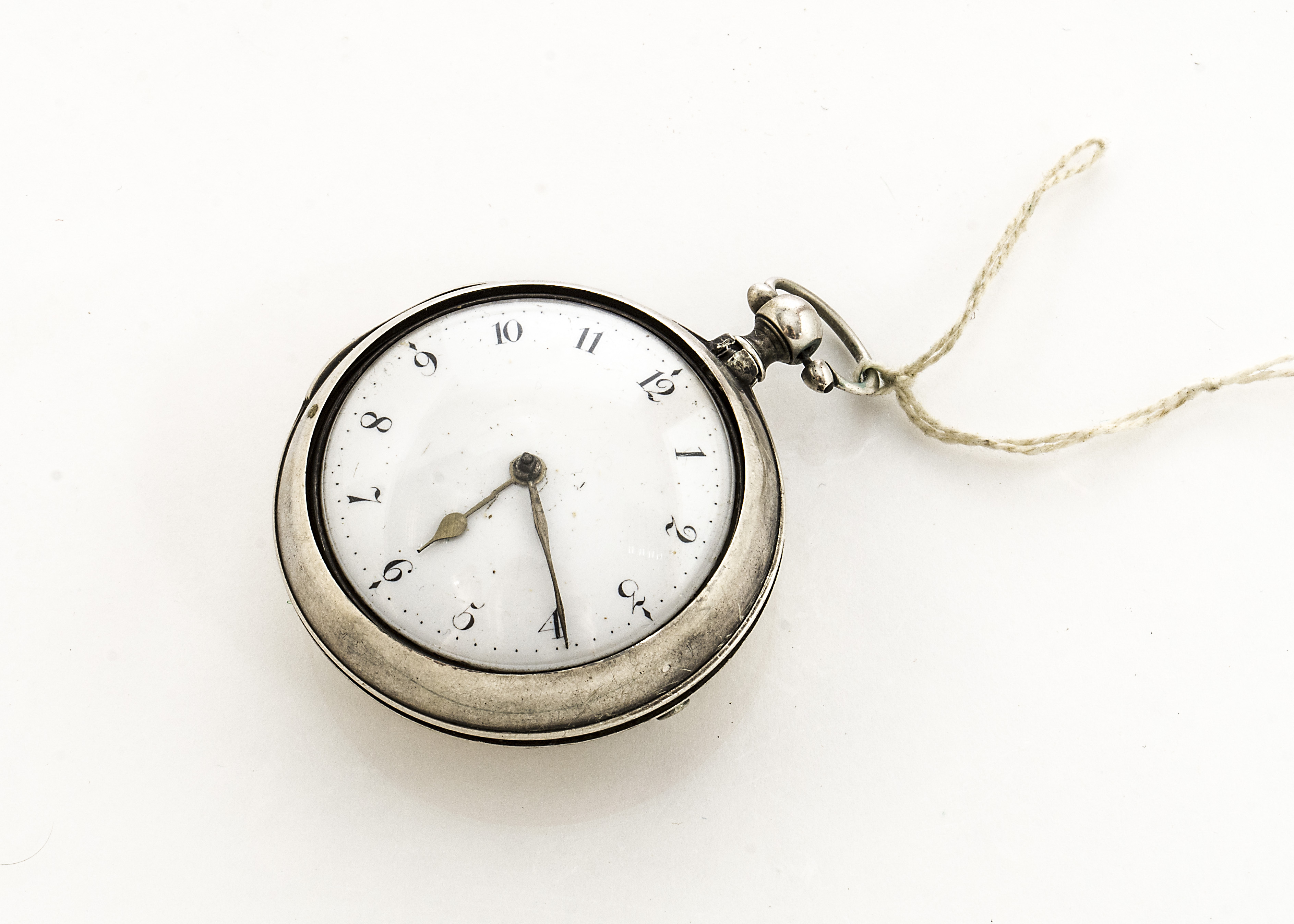 A George III silver pair cased pocket watch by James Parlett of London, 55mm outer case, London